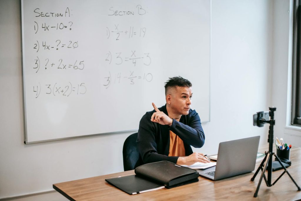 Photo Of Man Discussing Via Smartphone